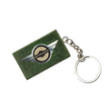 A rectangular green textured leather keychain featuring the Mathewsons winged wheel emblem in the center, attached to a silver metal split key ring, shown against a solid black background.